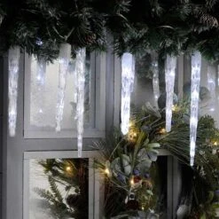 24 Colour Changing Icicle LED Lights On Clear Cable 14 24 Colour Changing Icicle LED Lights On Clear Cable -Christmas Decoration Store icicle multi white light1 web
