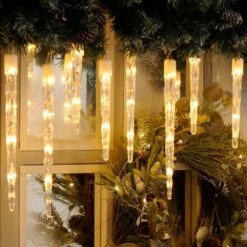 24 Colour Changing Icicle LED Lights On Clear Cable 18 24 Colour Changing Icicle LED Lights On Clear Cable -Christmas Decoration Store icicle white ww light1 web
